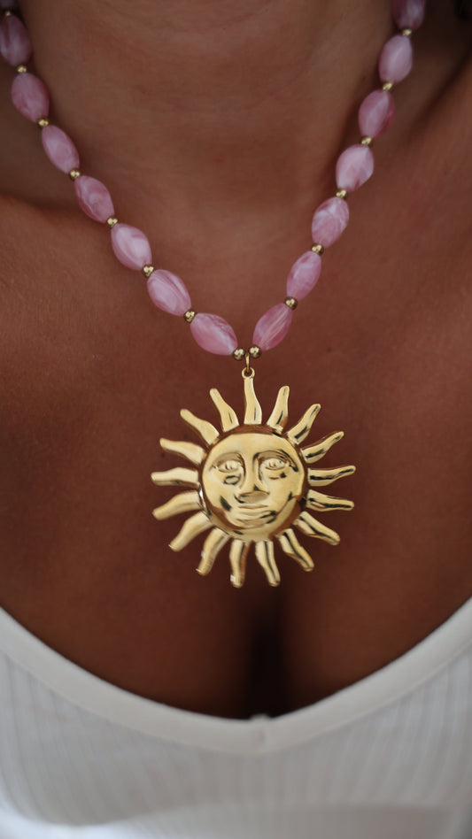 Colar sol rosa